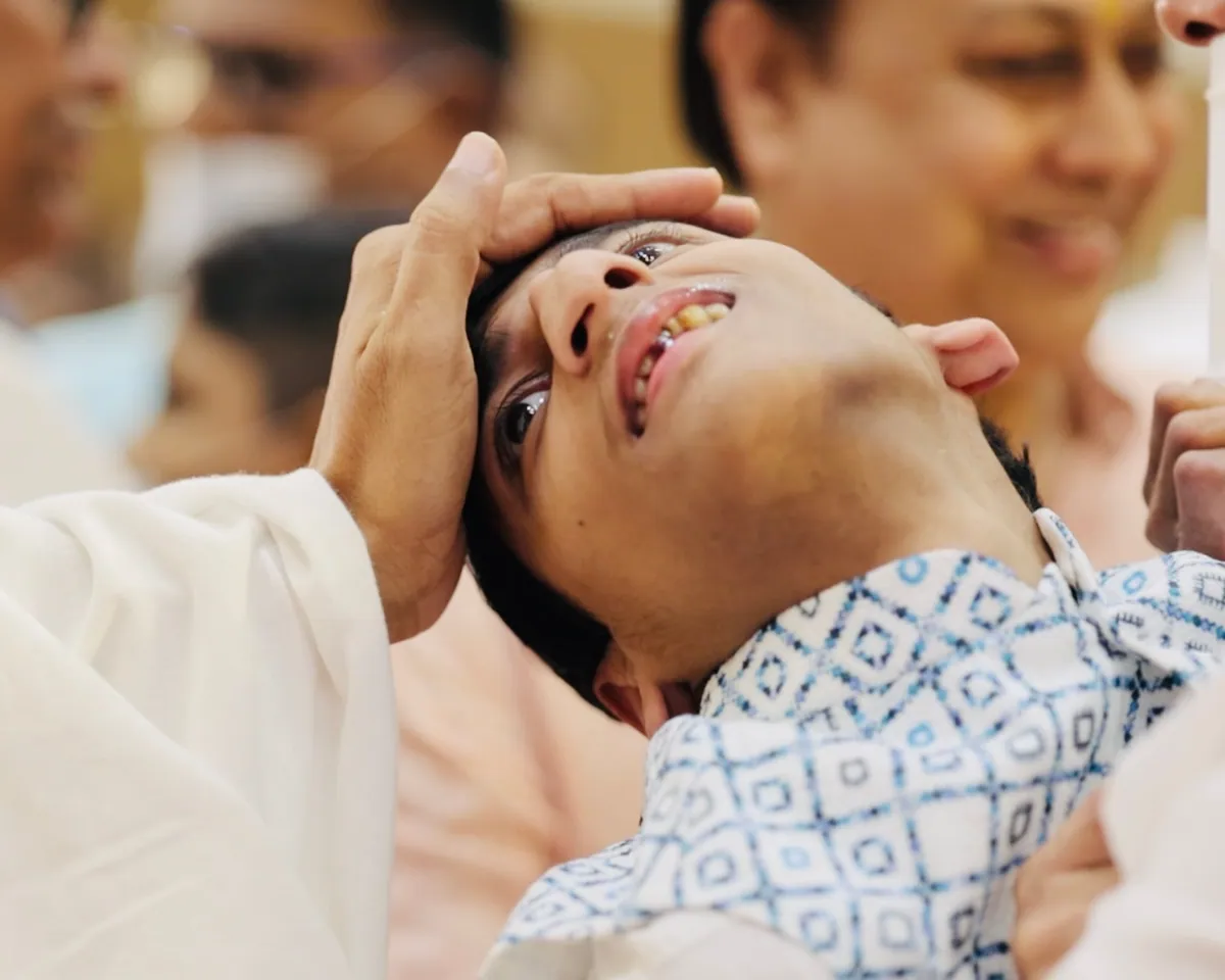 An ailing child quietly blessed by Param Gurudev Shree Namramuni Maharaj Saheb